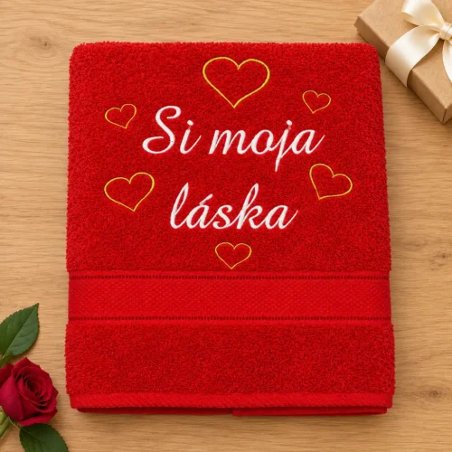 vysivana-osuska-si-moja-laska Červená vyšívaná froté osuška s bielym kaligrafickým nápisom Si moja láska a žltými srdiečkami